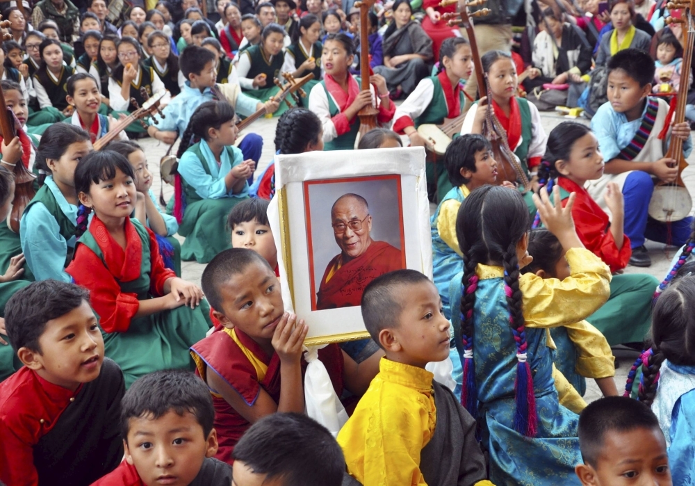 Celebrations mark the Dalai Lama's 80th birthday in Dharamsala, India, in July 2015. The question of who will succeed the Tibetan leader, Tenzin Gyatso, now 88, looms large. | REUTERS
